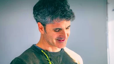 Spataro sonriente en boxes